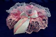 Подвязка для невесты кружевная бело-розовая с бело-розовым бантиком арт.019-028